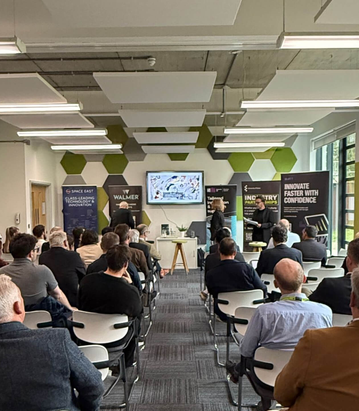 The stage and audience at the Colchester edition, Innovation Centre.
